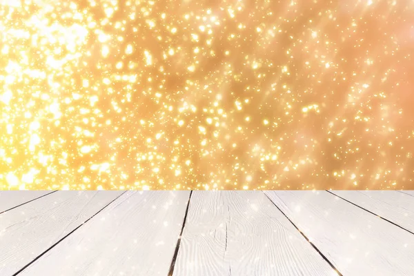 Natale sfondo astratto con bokeh rotondo dorato o cerchio luci glitter e tavolo bianco. Utilizzare per visualizzare o montare i vostri prodotti — Foto Stock