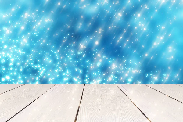Χριστούγεννα αφηρημένο μπλε φόντο με χρυσό στρογγυλά φώτα bokeh ή κύκλος γκλίτερ και λευκό τραπέζι. Χρησιμοποιήστε για την επίδειξη ή μοντάζ σας προϊόντα — Φωτογραφία Αρχείου