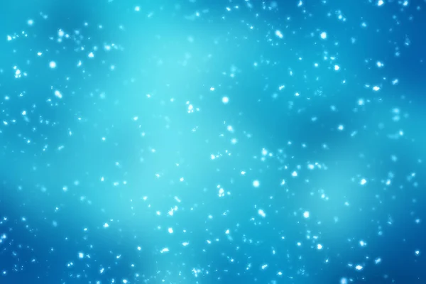 Boże Narodzenie światła świecidełka streszczenie bokeh na niebieskim tle. Okrąg rozmyte cząstek — Zdjęcie stockowe
