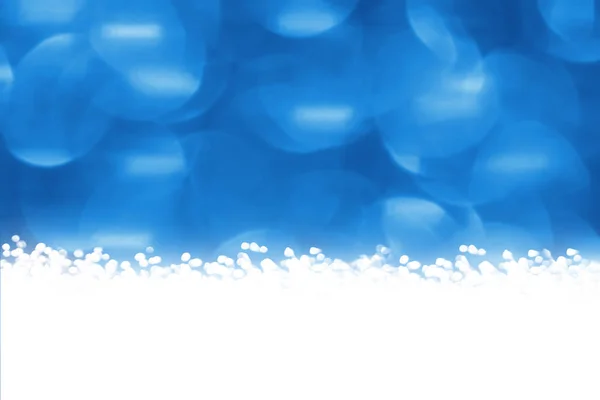 Kerstmis ronde gouden bokeh of glitter lampjes op blauwe achtergrond. Gouden cirkel intreepupil deeltjes — Stockfoto