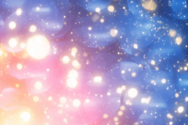 Arka plan mavi yuvarlak altın bokeh veya parlak ışık üzerinde Noel. Altın daire defocused parçacıklar