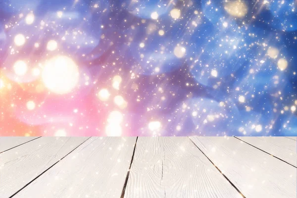 Arka plan mavi yuvarlak altın bokeh veya parlak ışık üzerinde Noel. Altın daire defocused parçacıklar