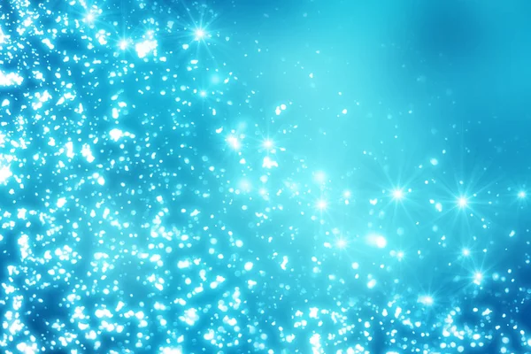Navidad abstracta bokeh luces de brillo sobre fondo azul. Partículas de círculo desenfocadas redondas — Foto de Stock