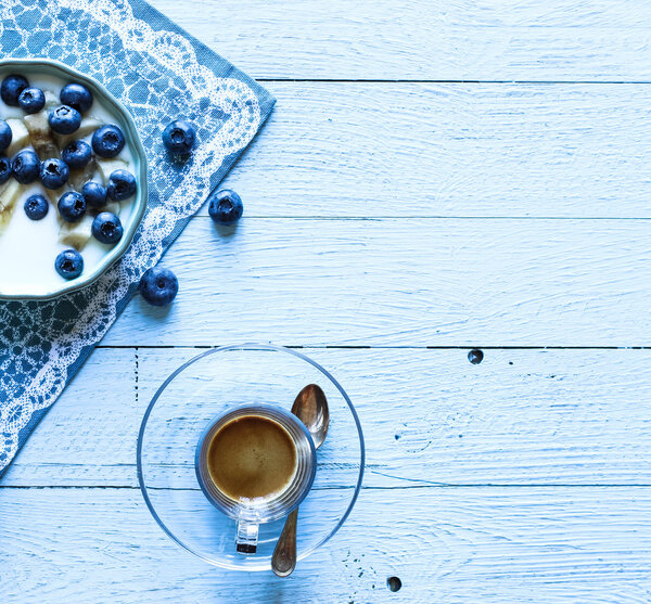 Healthy Breakfast with blueberries and banana yogurt