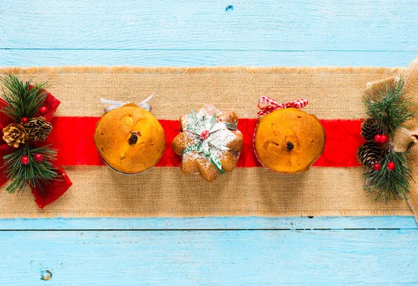 Mini panettone with fruits and Christmas decoration, — Stock Photo, Image
