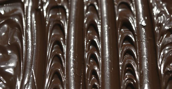 Coklat Susu Cair Dengan Pola Bergelombang — Stok Foto