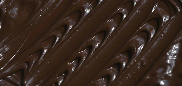 Coklat Susu Cair Dengan Pola Bergelombang — Stok Foto