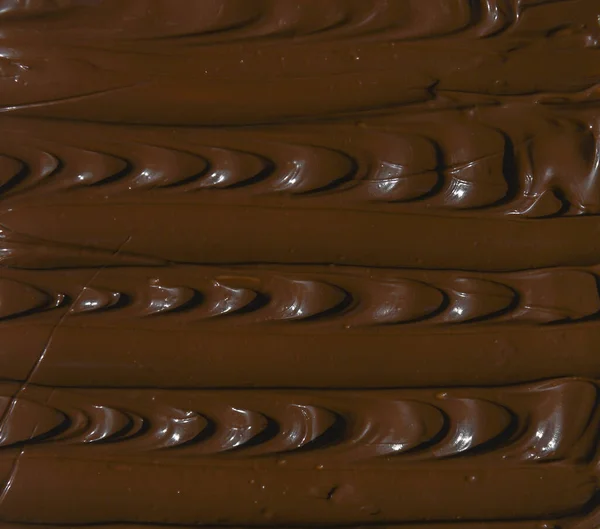 Coklat Susu Cair Dengan Pola Bergelombang — Stok Foto
