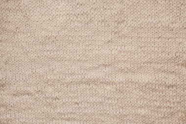 Bej renkli yün dokulu arka plan, vintage eski tarzı örgü yakın çekim