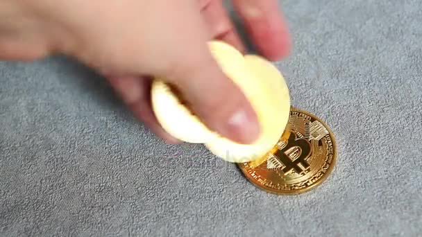 Hand Put Golden Bitcoin Cryptocurrency Gray Table — Stock Video