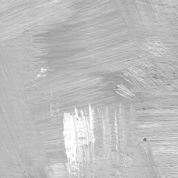 Pomalowane na biało teksturowanej tło z pociągnięcia pędzlem w odcieniach czerni i szarości. — Zdjęcie stockowe