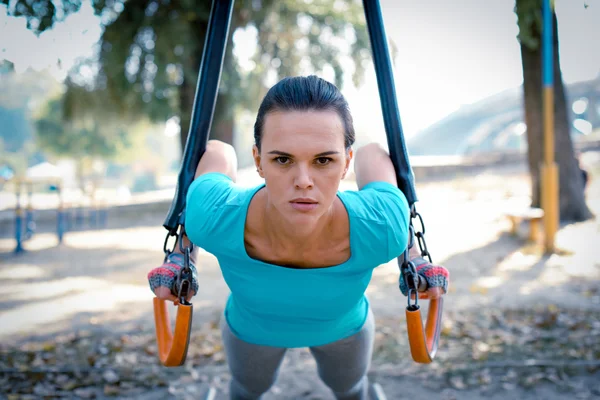 Serious woman training in the park — Stock Photo, Image