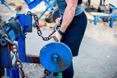 Man with barbell during workout  clipart