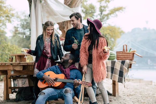 Happy young people at picnic — Stock Photo, Image