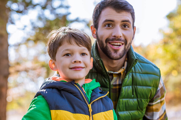 Happy father and son in park