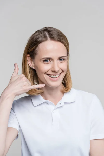 Woman with call me symbol — Stock Photo, Image