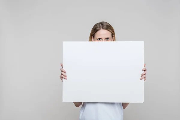 Woman with blank board — Stock Photo, Image