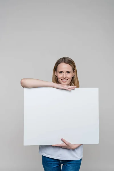 Woman with blank board — Stock Photo, Image