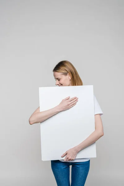 Femme avec tableau blanc Image En Vente