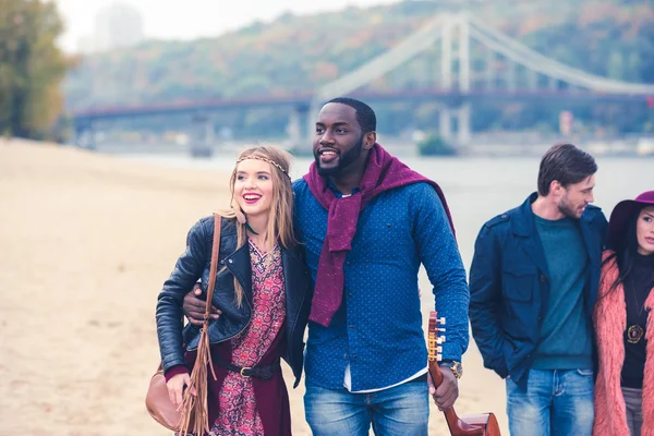 Pleasant stroll on river beach — Stock Photo