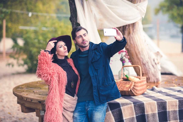 Couple making self portrait — Stock Photo