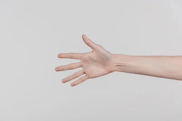 Allungando la mano — Foto stock