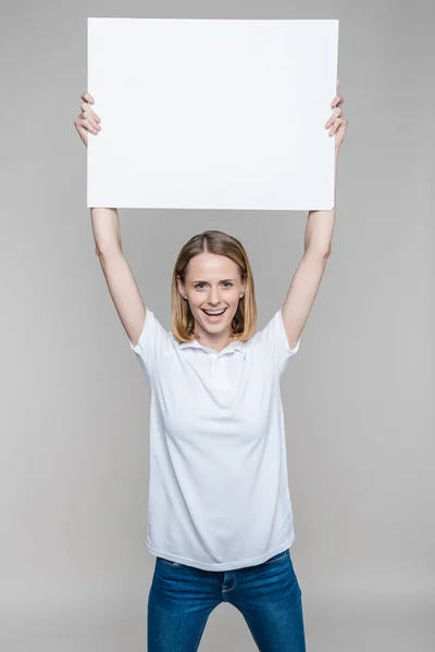 Woman with blank board — Stock Photo