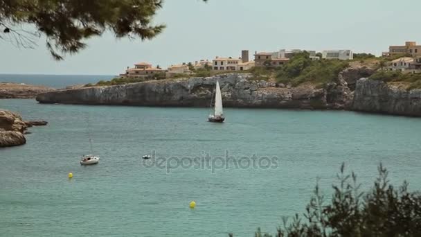 Sea Bay with beach and yachts. Spanish Parking for yachts in a provincial town Porto Cristo. Mallorca — Stock Video