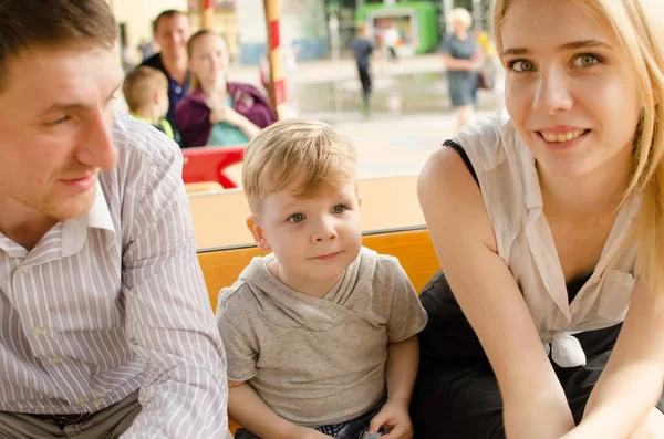 Young family is having fun in the park — Stock Photo, Image
