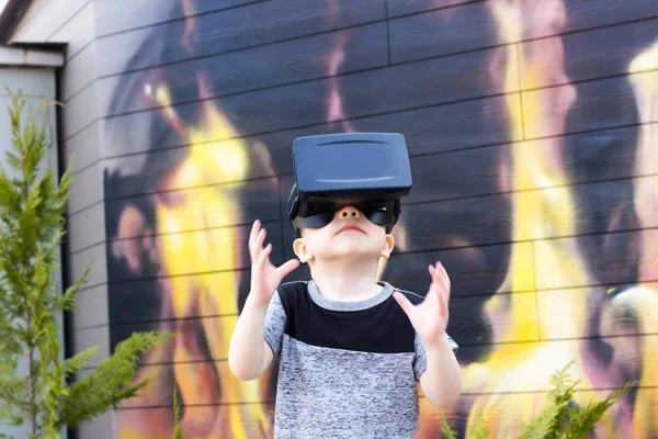 Boy with the virtual glasses Stock Picture