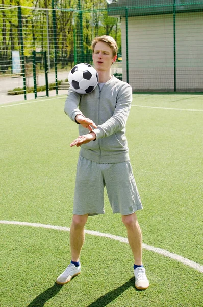 Young man making football freestyle — Stock Photo, Image