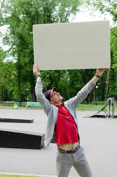 Man with white billboard — Stock Photo, Image