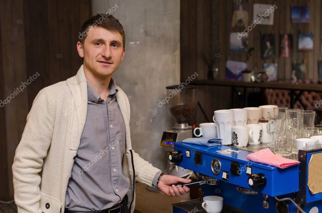 Young Man Making Coffee Stock Photo Young Man Making Coffee Stock Photo
