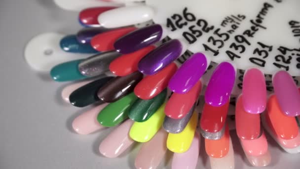 Closeup of multicolorful nail polish set template — Stock Video