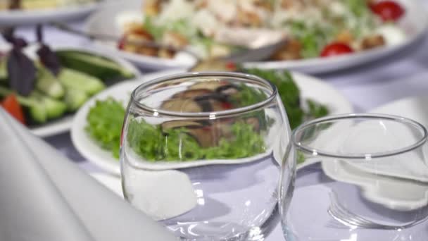 Tasty dishes on the table in the restaurant — Stock Video