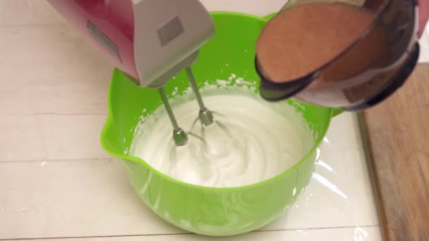 Mixing dough with srup in the bowl slow motion — Stock Video