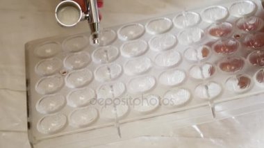 Kadının ellerini şeker formları yavaş hareket için renk püskürtme