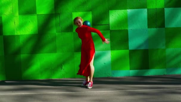 Young woman dancing with the ball — Stock Video