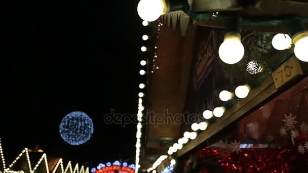 CHRISTMAS FESTIVE NIGHT DRIVE - WINTER CITY CHRISTMAS SPHERE MADE OF LIGHT BULBS — Stock Video