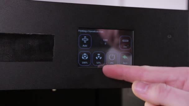 3D technology mans hand presses the printers buttons preparing it for printing — Stock Video