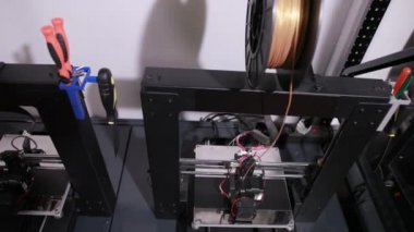 3D technology the printer head prints a plastic part
