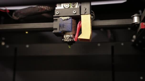 3D technology the printer prints part from plastic cable thread close up yellow — ストック動画