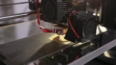 3D technology the printer head prints a plastic part