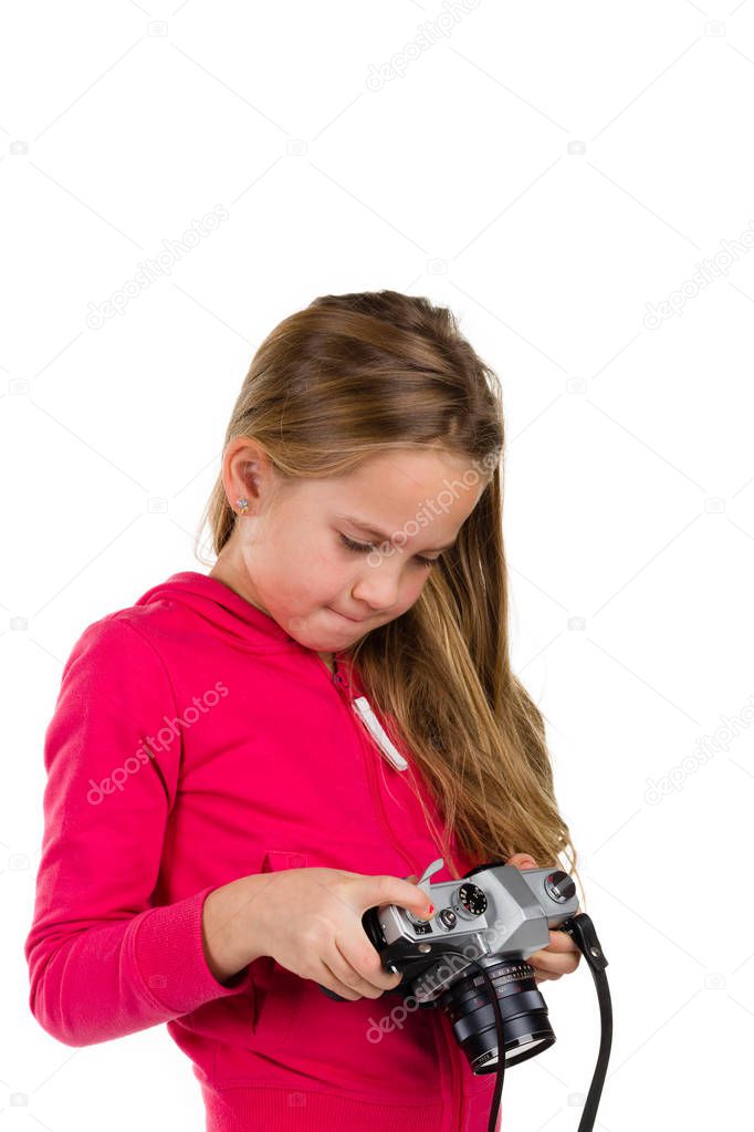 Girl with vintage camera isolated on white background