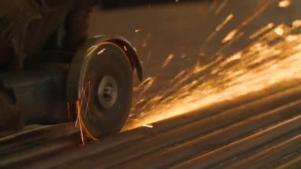 Man Saws Grinder Metal Face is Not Seen — Stock video