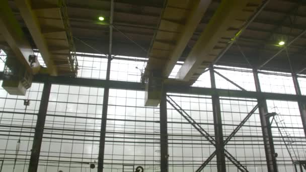 Factory Overhead Crane Inside a Factory Building — Stock Video