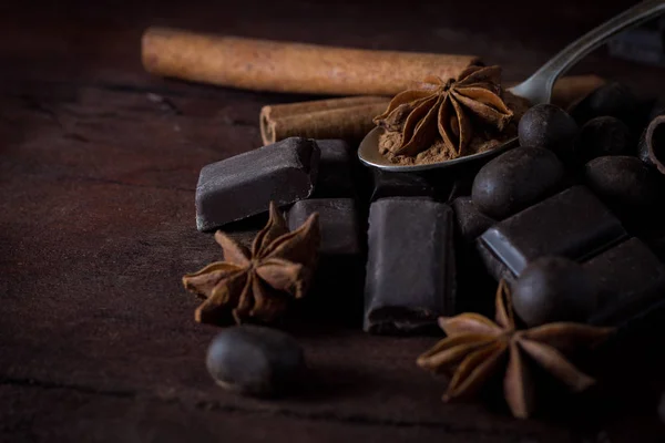 Black Chocolate, Spices, Tea Spoon on Wooden Background — Stock Photo, Image