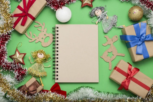 Notebook with a clean page and Christmas-tree decorations, New Y