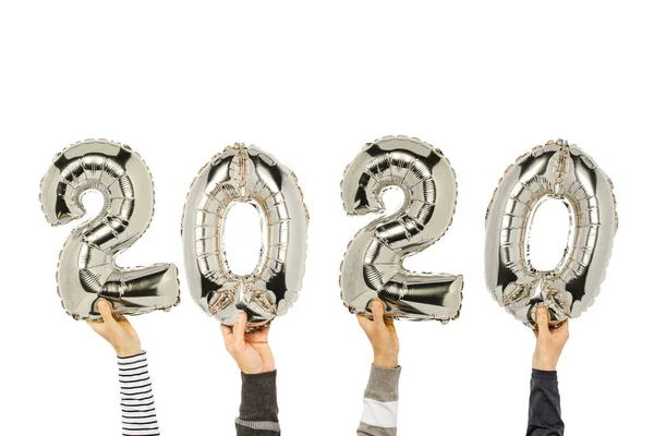 Hands holding balloons numbers 2020 on a white background. Concept new year, the onset of 2020, the year of the white rat — Stock Photo, Image