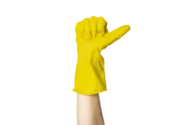 Una mano femenina en un guante de goma amarillo para limpiar muestra un gesto sobre un fondo blanco aislado. Todo bien, de alta calidad. Gesto hecho. — Foto de Stock